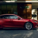Red 2025 Lexus ES parked on the street